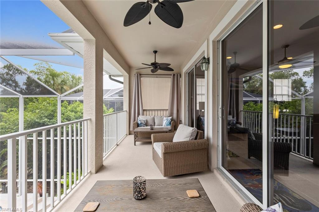 Screened balcony off the main living area overlooking the pool