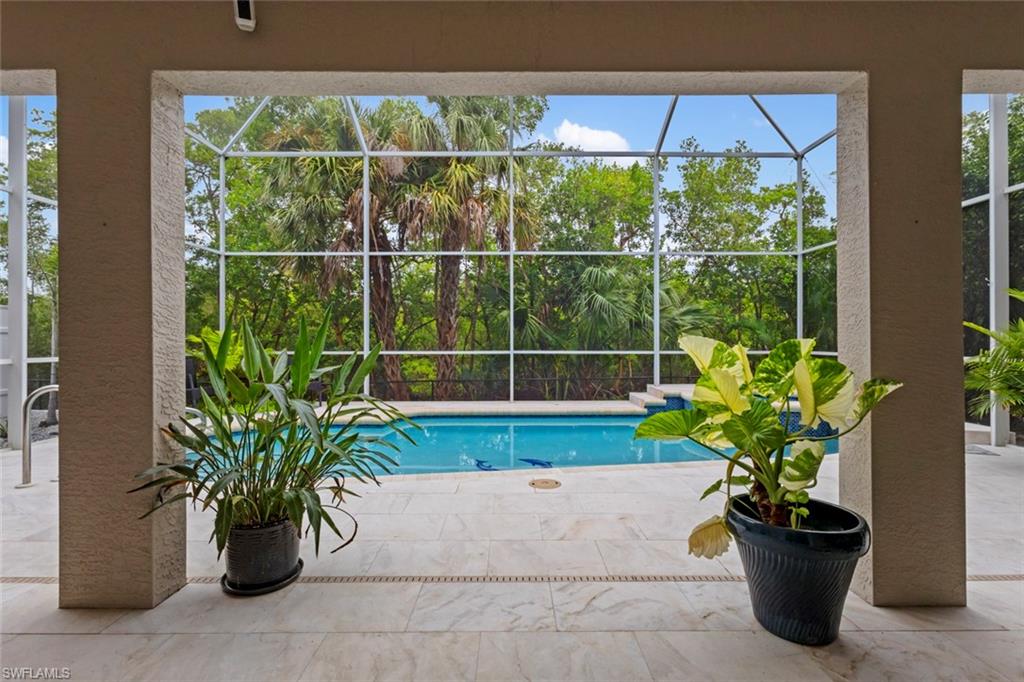 Covered lanai off pool area.