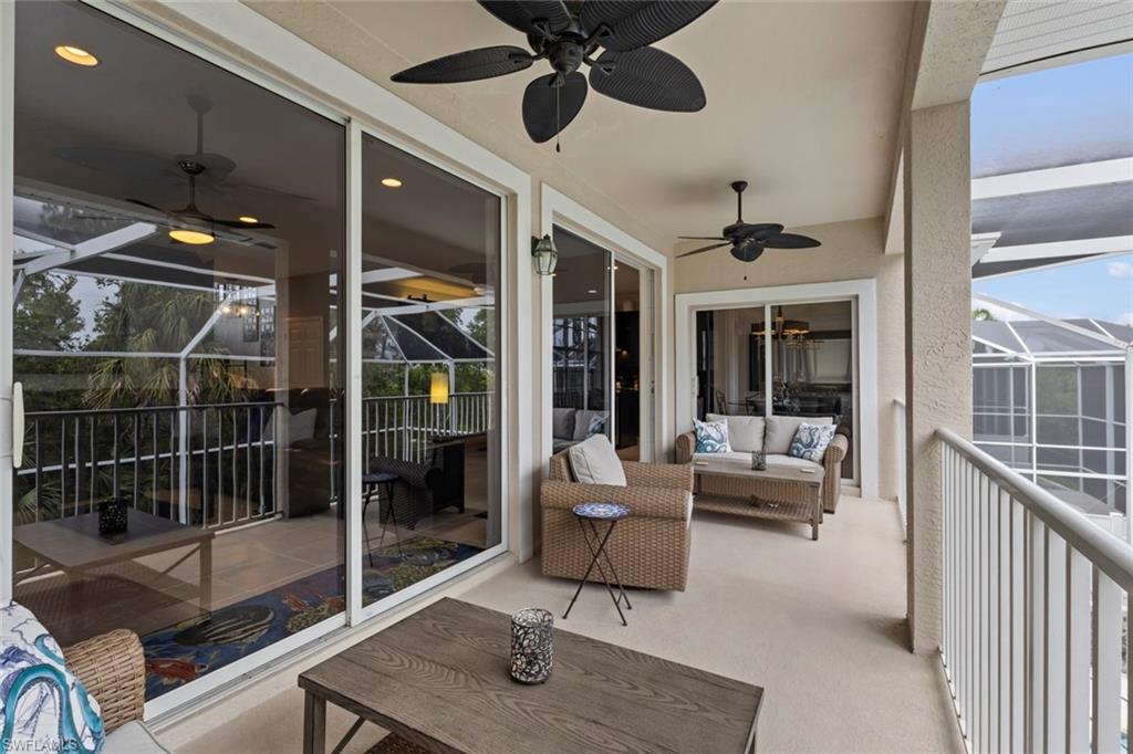 Screened balcony off the main living area overlooking the pool