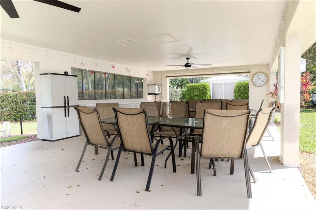 View of patio / terrace with a ceiling fan and outdoor dining space