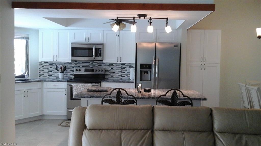 view of the kitchen from living area