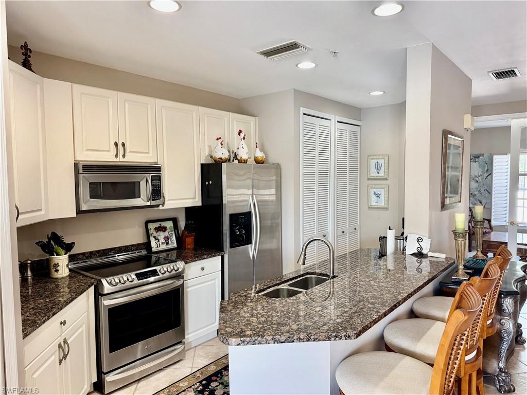 Stainless appliances, granite tops.