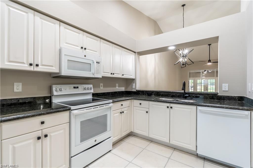 Open Kitchen with white Appliances