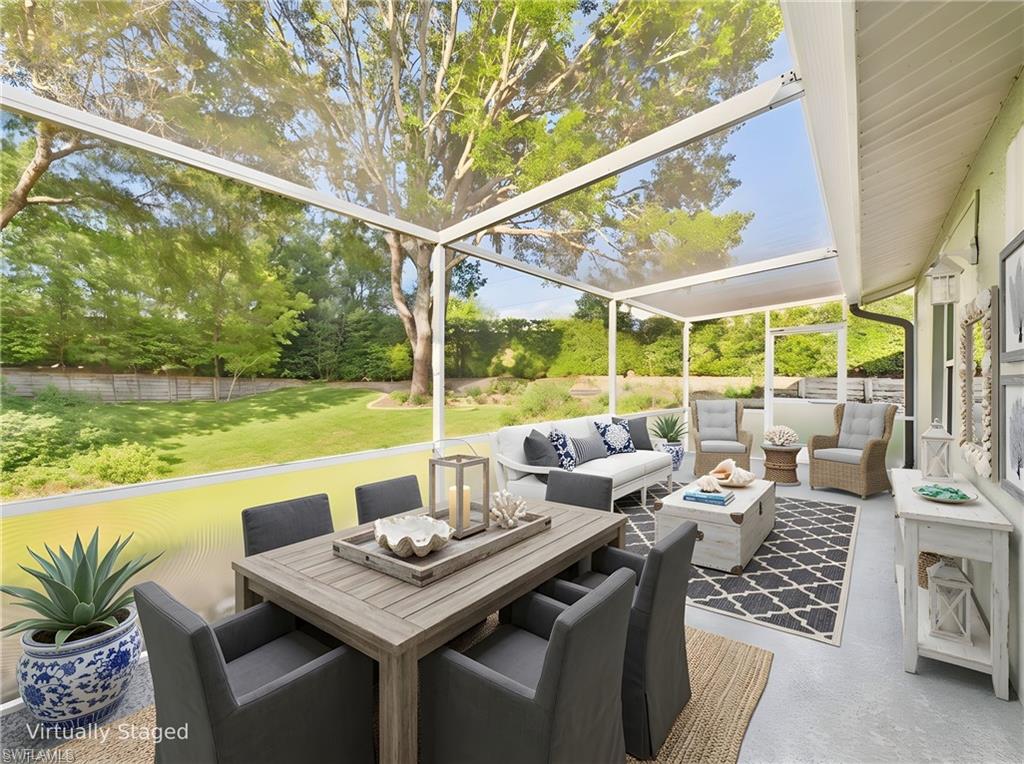 Virtually Staged fully screened-in Lanai with Preserve views