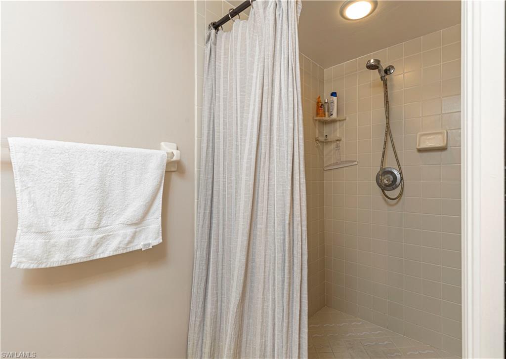 Bathroom featuring walk in shower