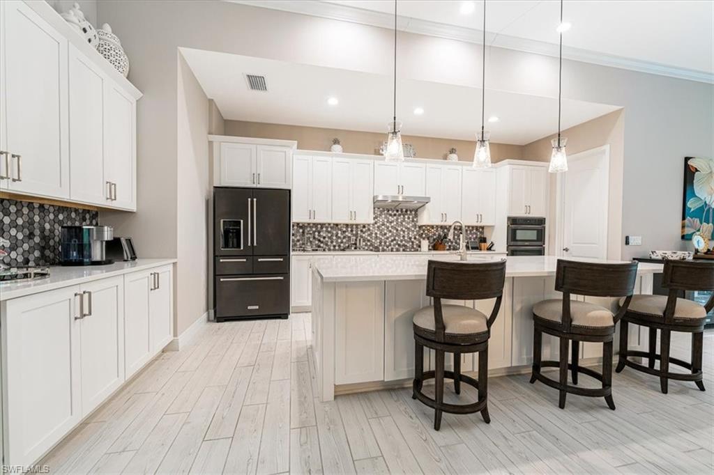 Open Floor Plan with Gorgeous Kitchen with Large Breakfast Bar