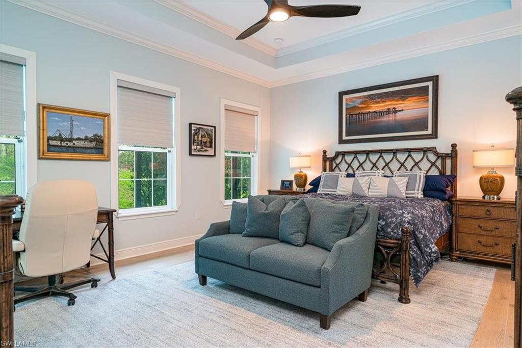 Large Master Suite with entrance to the Pool area