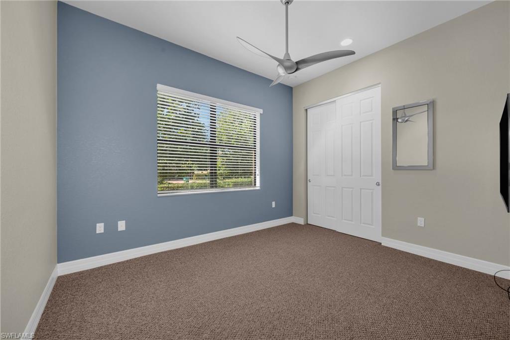 Versatile room ideal as a third bedroom, den, or home office with natural light.
