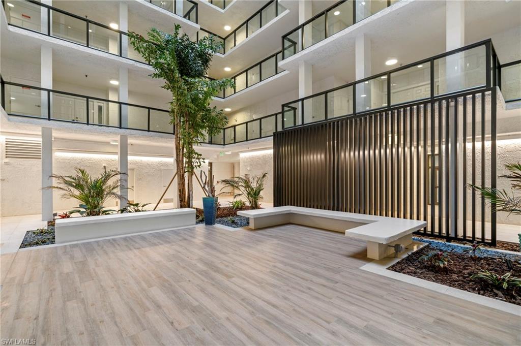 Building lobby with a high ceiling and recessed lighting