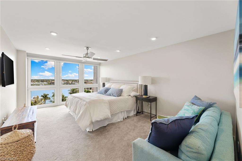 Bedroom with carpet, a ceiling fan, and recessed lighting