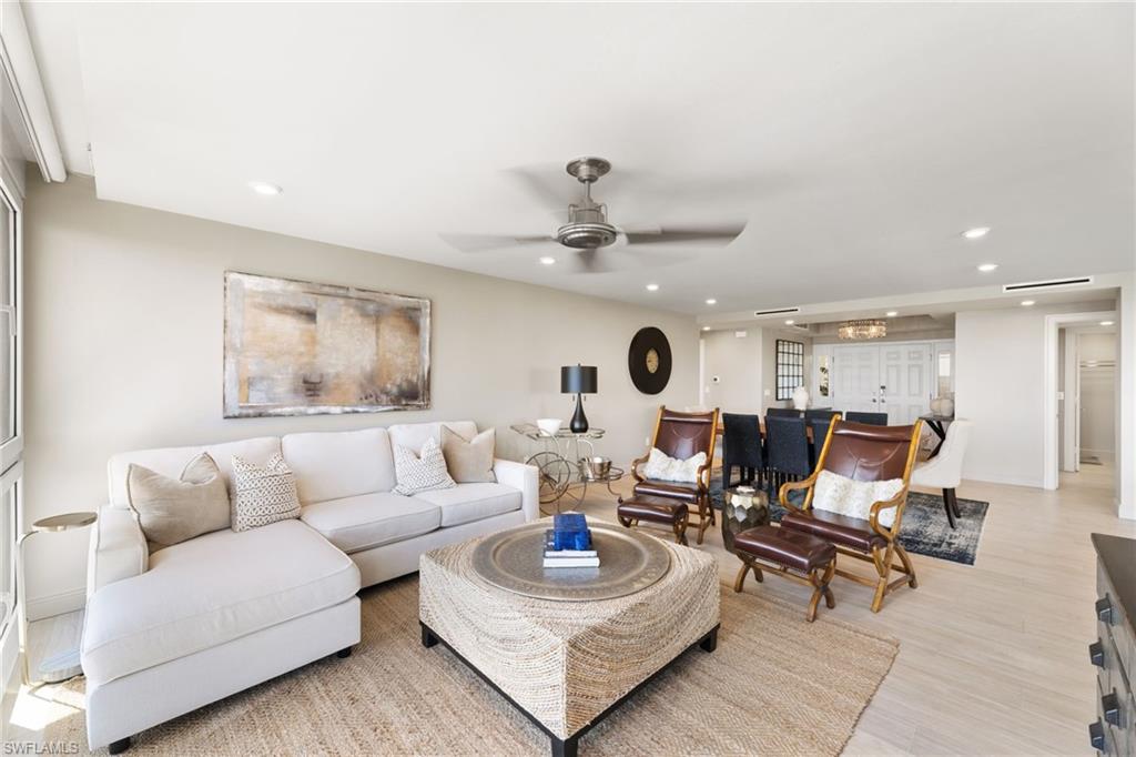 Living area featuring ceiling fan, recessed lighting, and light wood finished floors