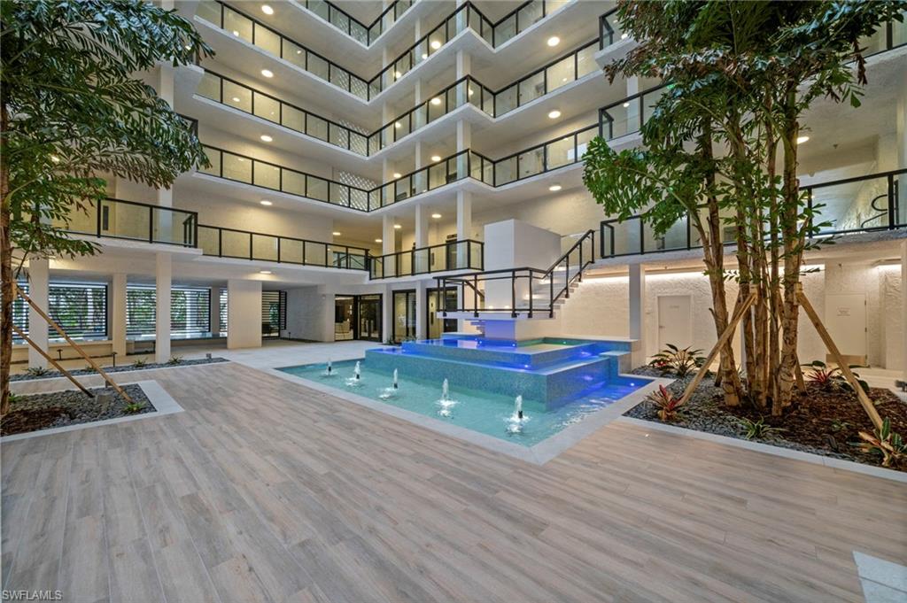 View of pool featuring a pool with connected hot tub