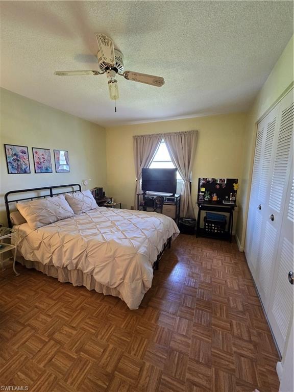The master bedroom is generously sized with a closet for storage.