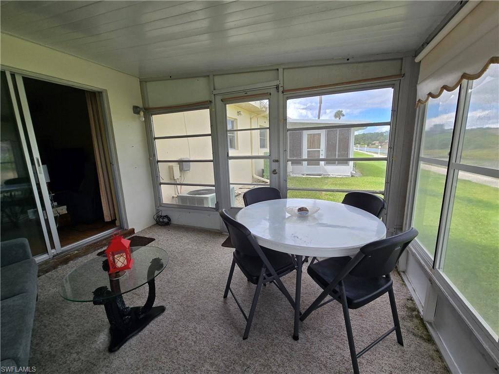 Enjoy a nice sized lanai/sun room with a canal view.