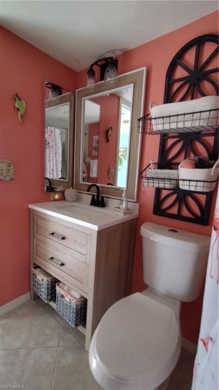 Bathroom featuring vanity and light tile patterned floors