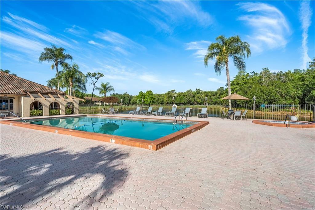 Community pool with a patio area