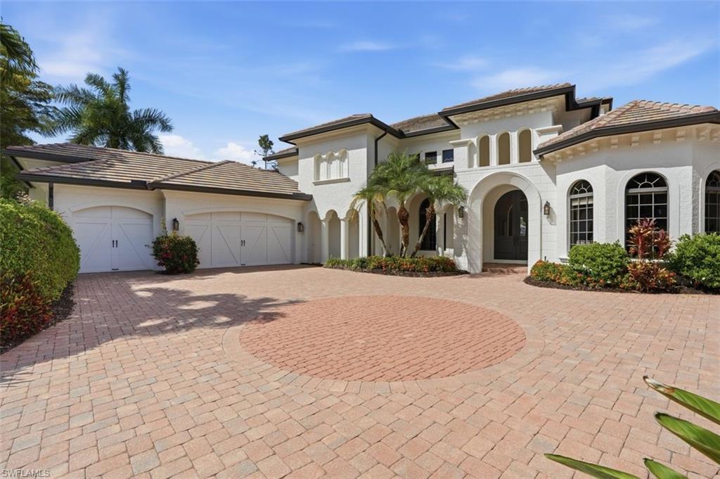 Exterior Front Showcasing the 3 Car Garage
