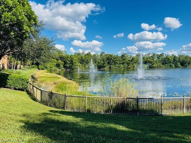 View of home's community featuring a water view