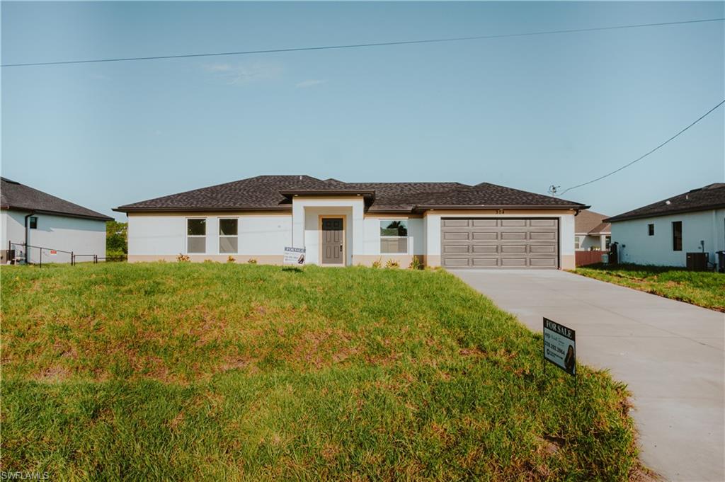 Contemporary single-story residence featuring a white stucco exterior, dark shingle roof, and a gray paneled garage door