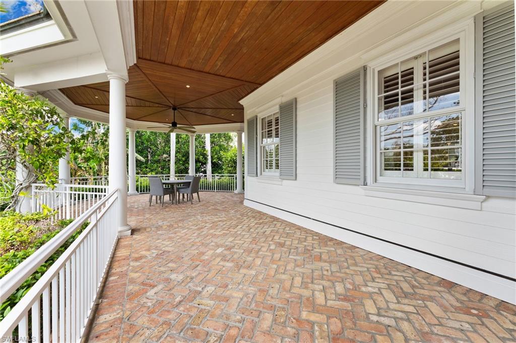 View of patio / terrace featuring ceiling fan, fence, and outdoor dining space