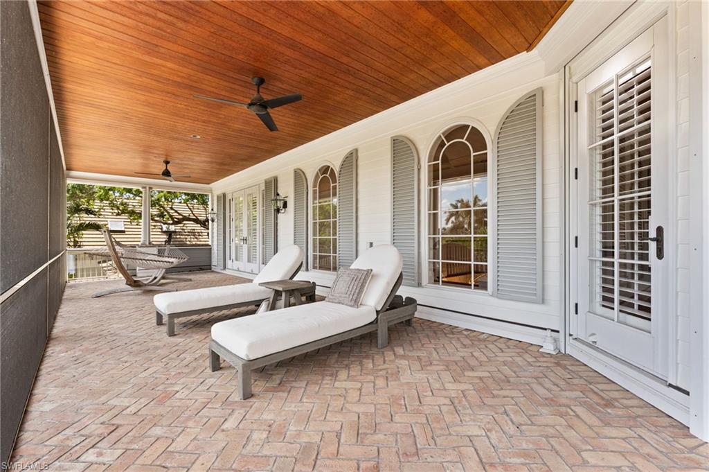 View of patio / terrace with a ceiling fan and covered porch