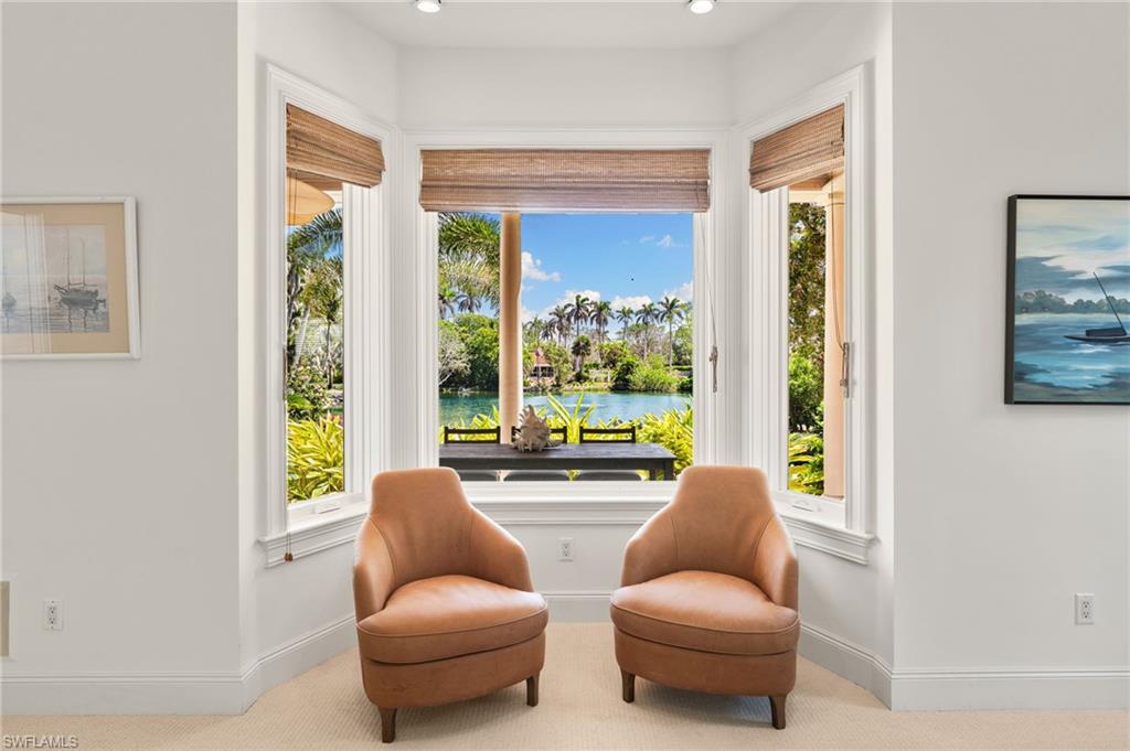 Sitting room with baseboards, recessed lighting, and carpet flooring