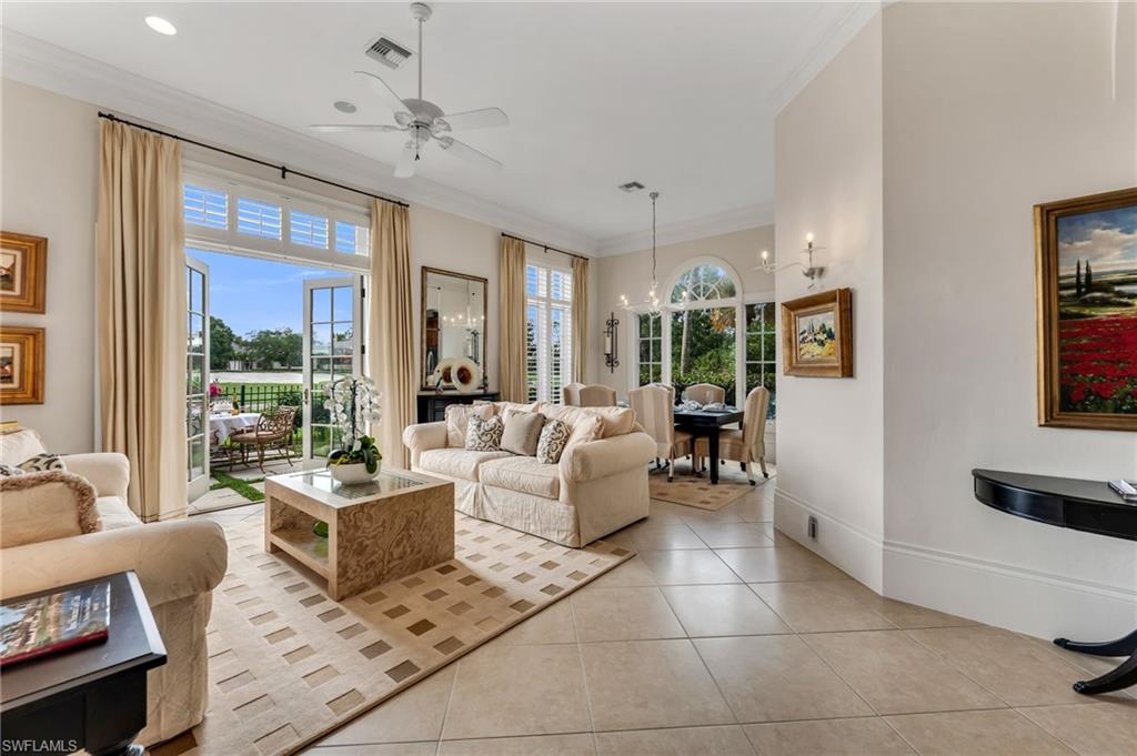 The living room French doors open out to the best seat in Grey Oaks...views of the golfers coming home!