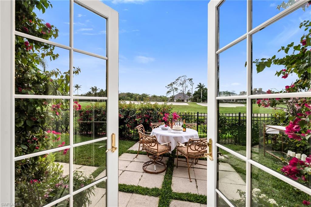 Your private garden has views of the 18th, Clubhouse and golf and water views beyond.