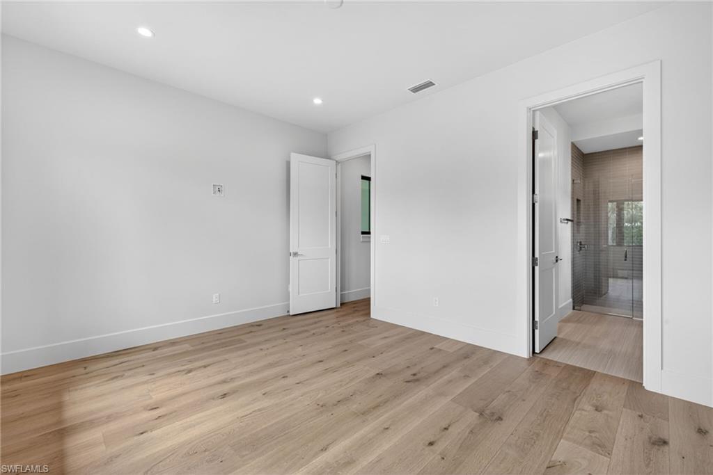 Bedroom 2 with en suite bathroom and walk-in closet