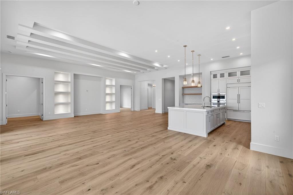 Large bright open concept floor plan has great flow for family gatherings and entertaining