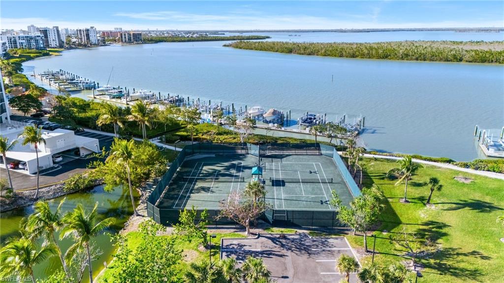 Bird's eye view of tennis courts and boat dock virtually edited