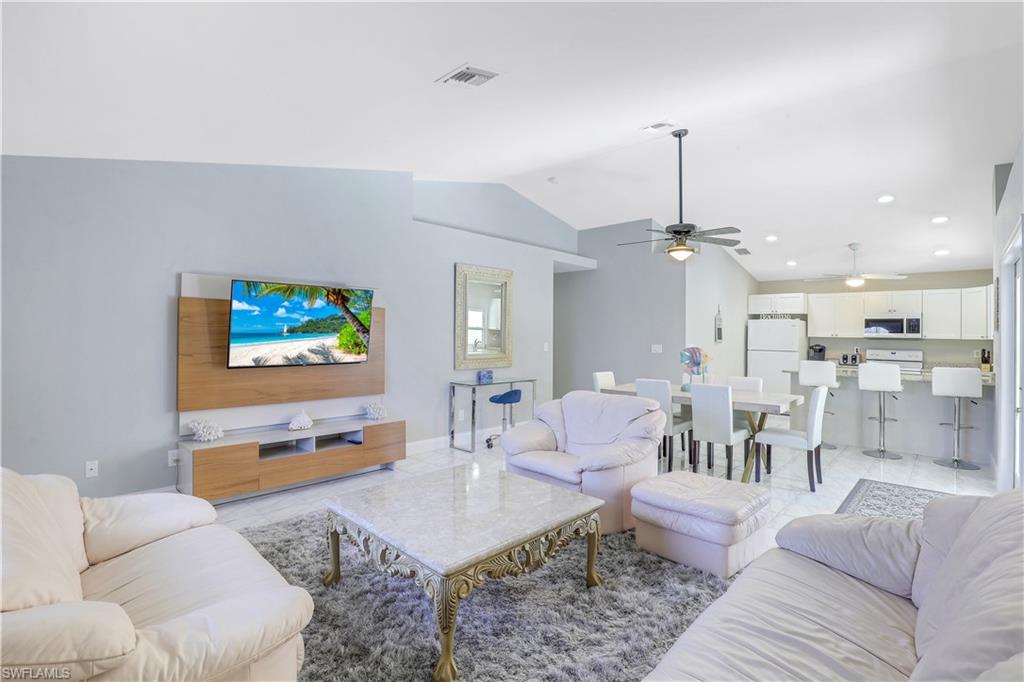 Living area featuring ceiling fan
