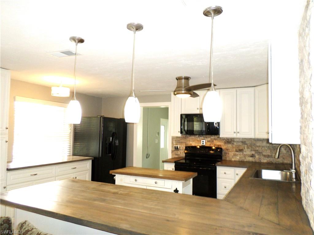 Large Kitchen With Spacious Counter Tops.