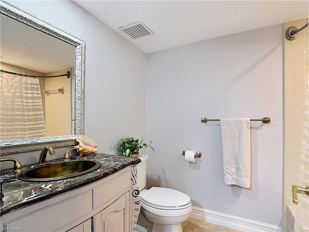 Well-maintained bathroom with clean finishes and functional layout.