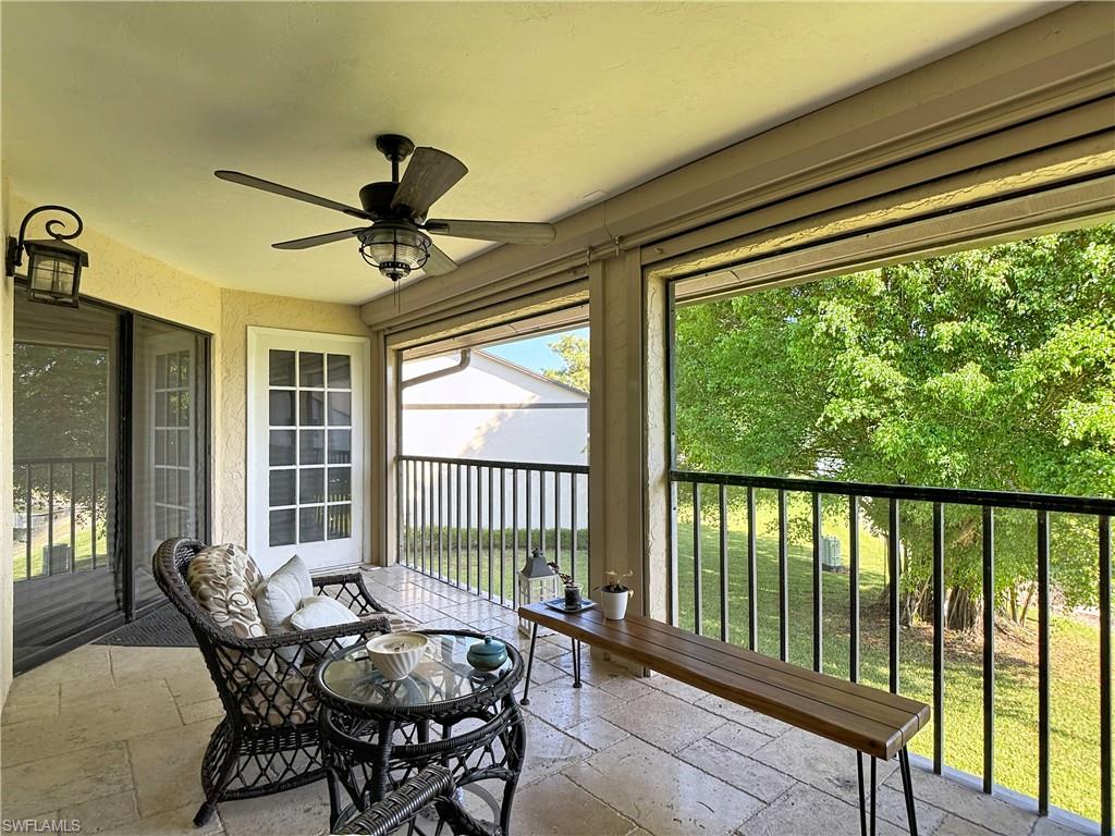 Screened-in balcony offering tranquil surroundings and fresh air.