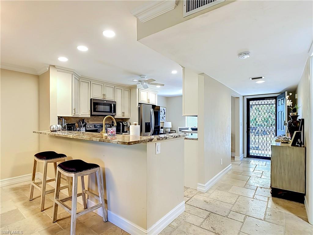 Well-appointed kitchen with open layout and clean finishes.