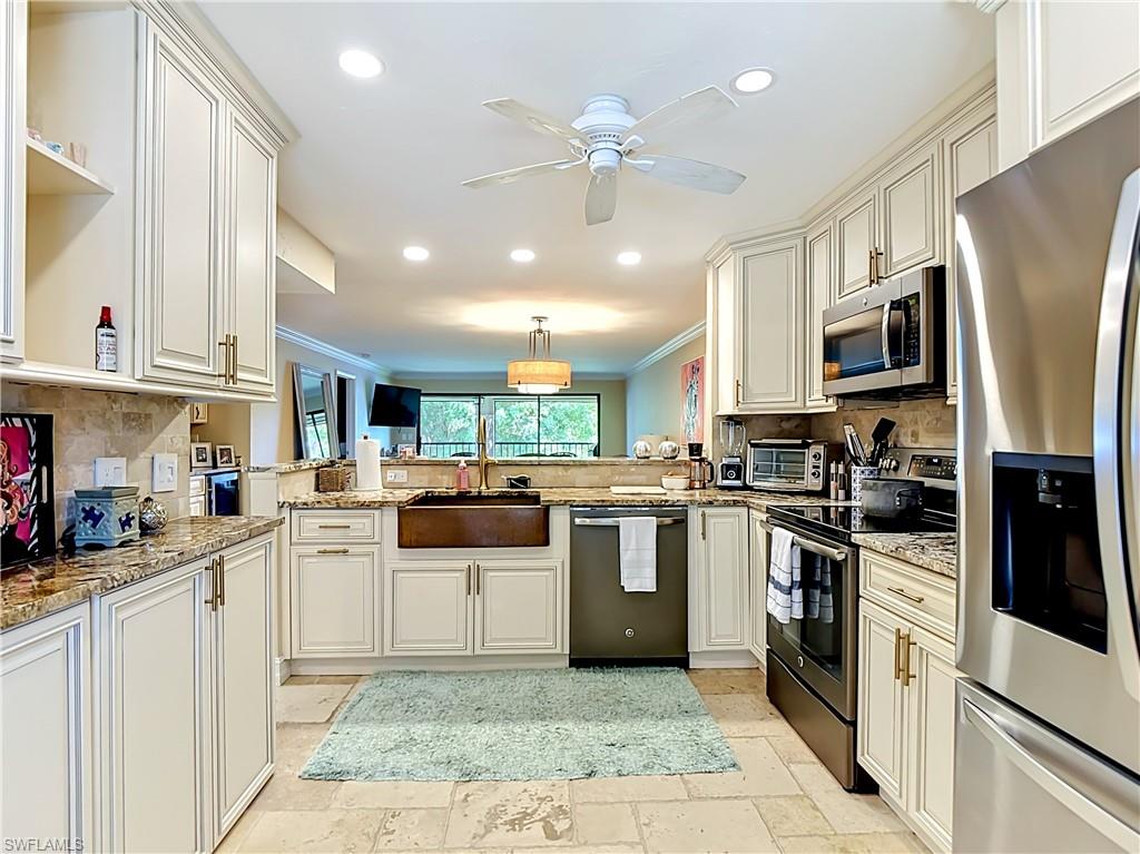 Spacious kitchen with modern appliances and generous counter space.