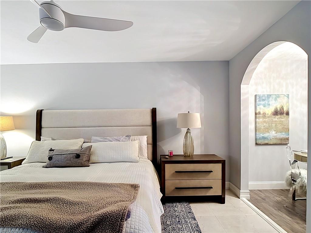 Comfortable bedroom featuring clean finishes and ample closet space.