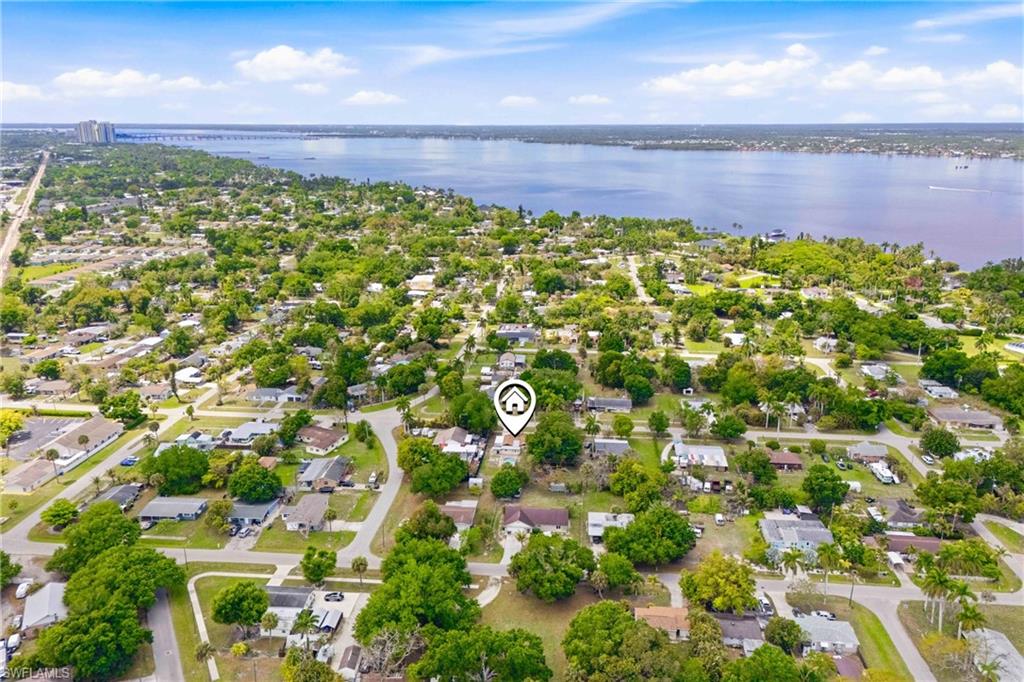 Sweeping overhead view highlighting the neighborhood layout, street design, and surrounding area.