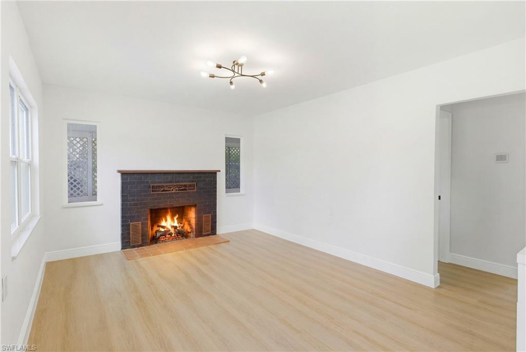Well-appointed living room showcasing a fireplace that adds both style and coziness to this comfortable living space.