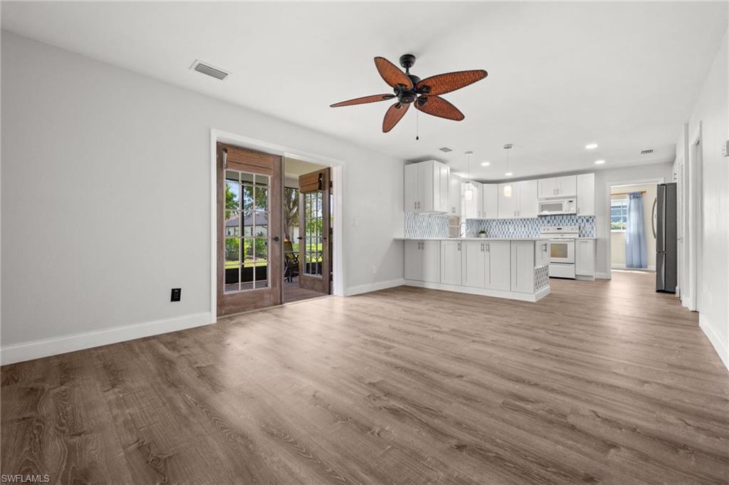 Family Room looking toward the Screened Lanai and Remodeled Kitchen