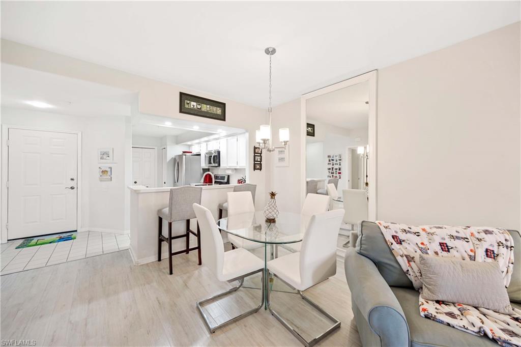 Dining area featuring light wood finished floors and baseboards