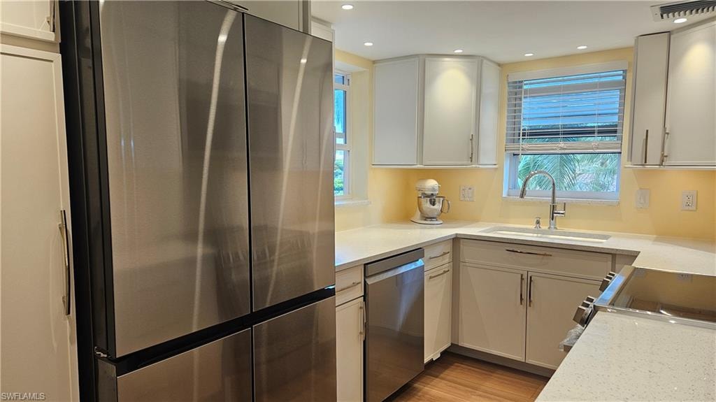 View of Pantry, Refrigerator, cabinetry,dish washer, sing and cook top
