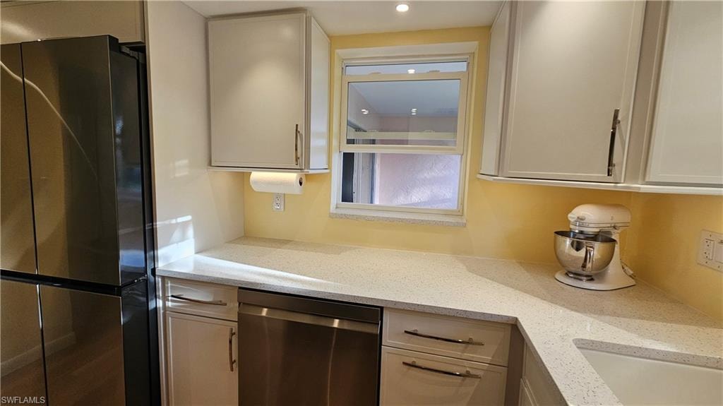 Kitchen with counter tops and PASS-THROUGH WINDOW to Lanai