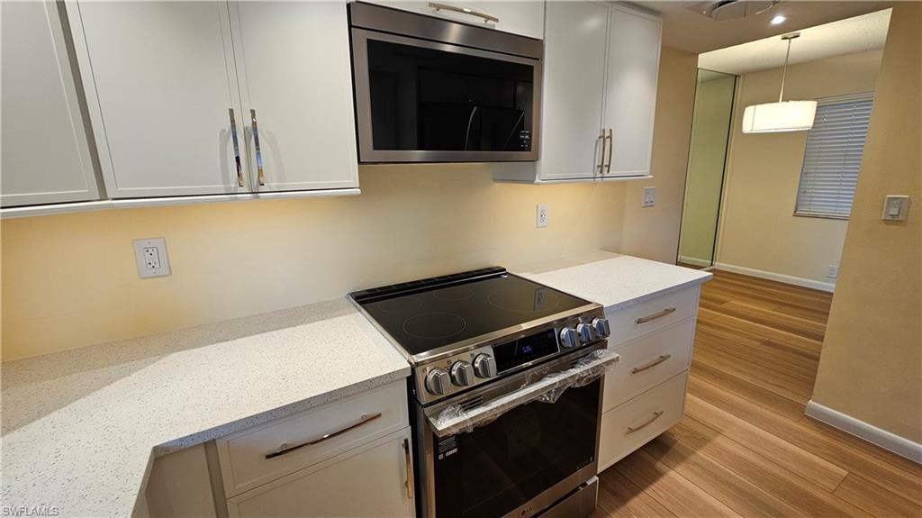 Induction range and flush microwave