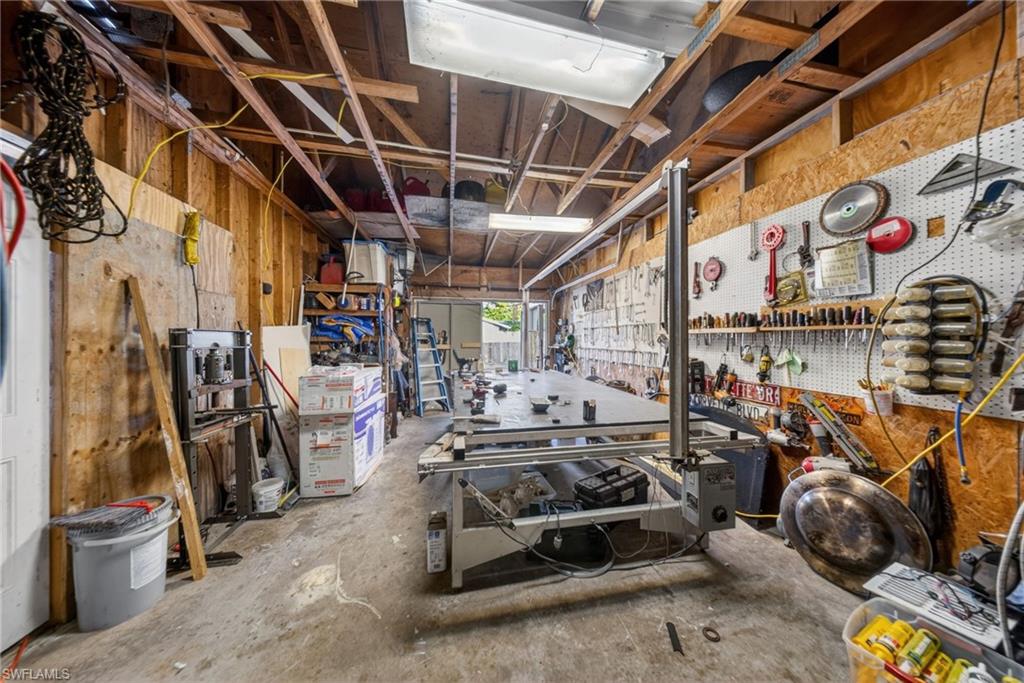 Garage featuring a workshop area
