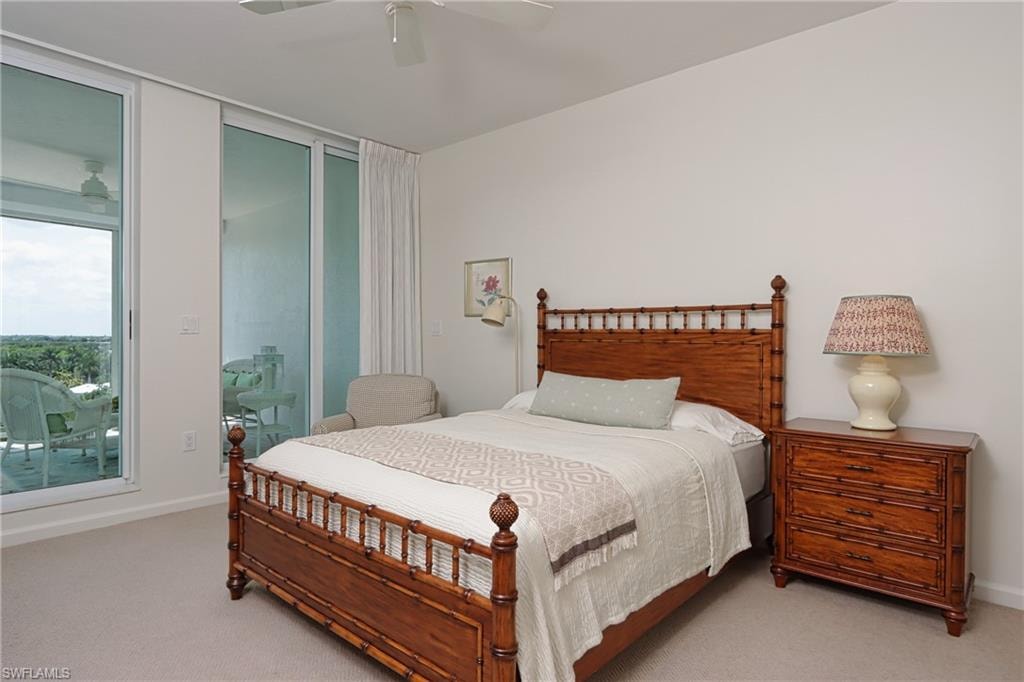Carpeted bedroom with ceiling fan