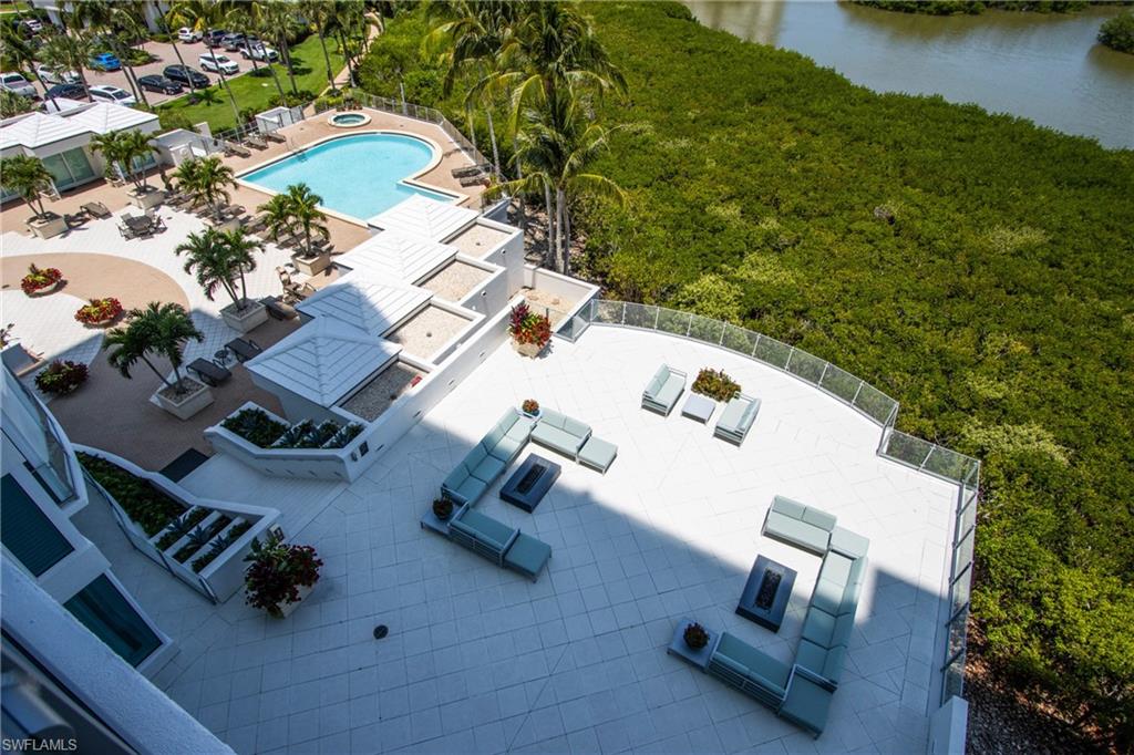 Bird's eye view with a Pool and Beach
