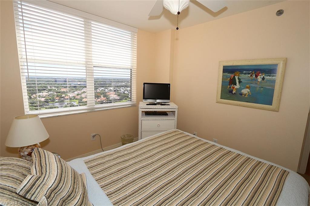 Bedroom with carpet and ceiling fan