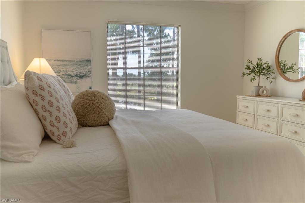 Bedroom with ornamental molding